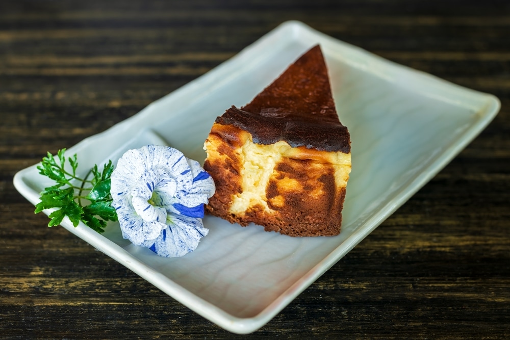 Cheesecakes With Fresh Clitoria Ternatea Flower In The Plate