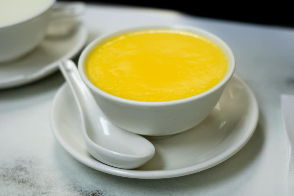 Hong Kong steamed milk pudding in a white bowl