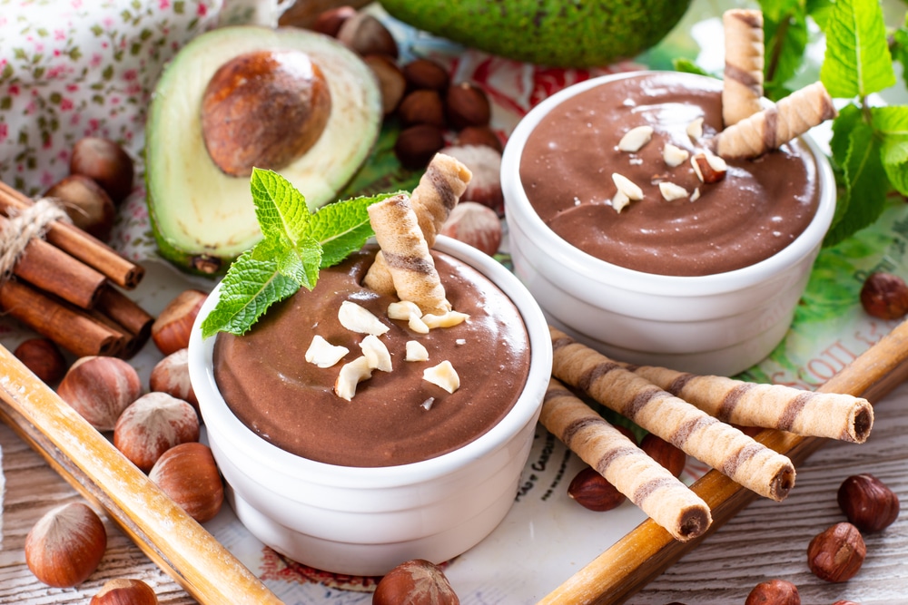 Raw Avocado Chocolate pudding Topped With Chocolate And Mint 