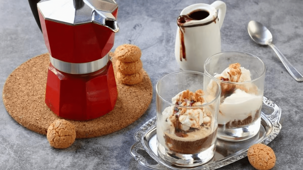 Affogato with coffee along with the coffe maker