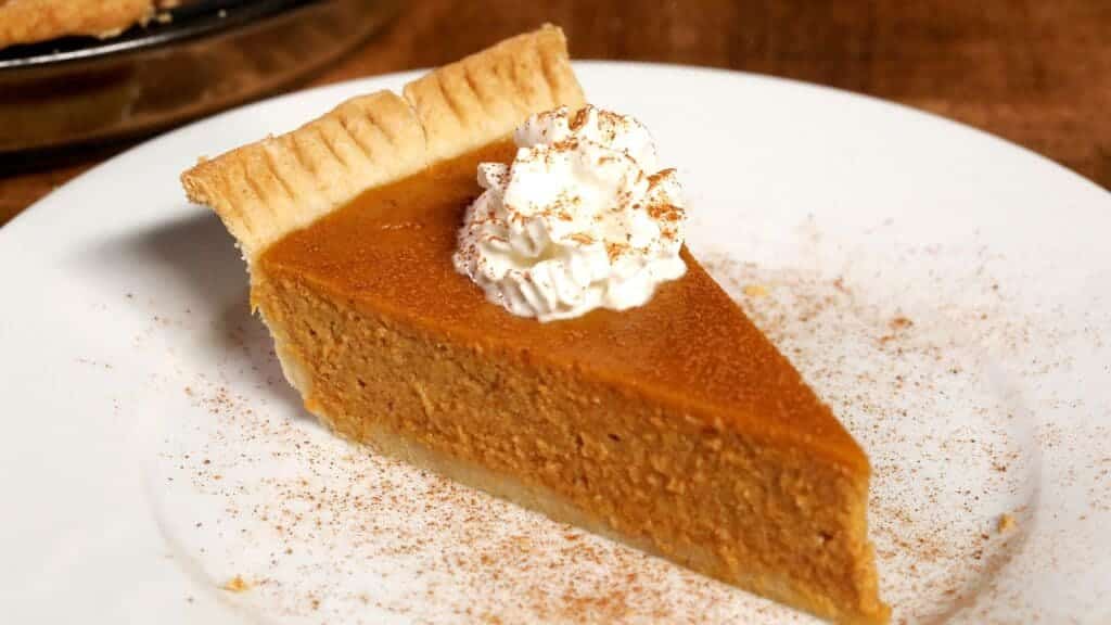 a slice of pumpkin pie serve in a plate