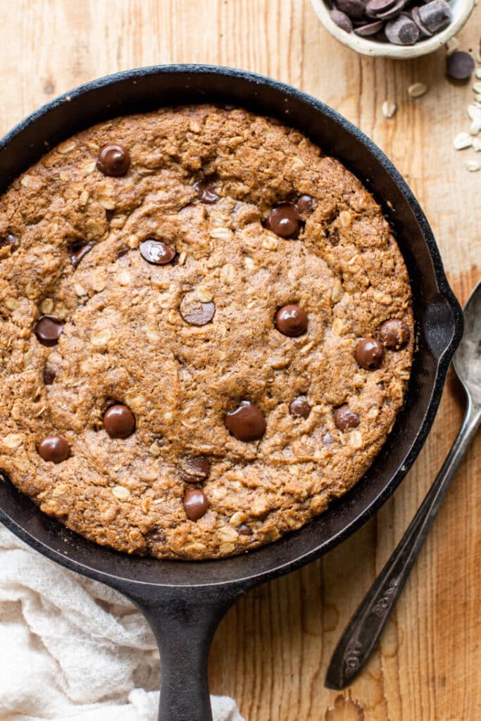 An overhead view of a chocolate chip skillet cookie