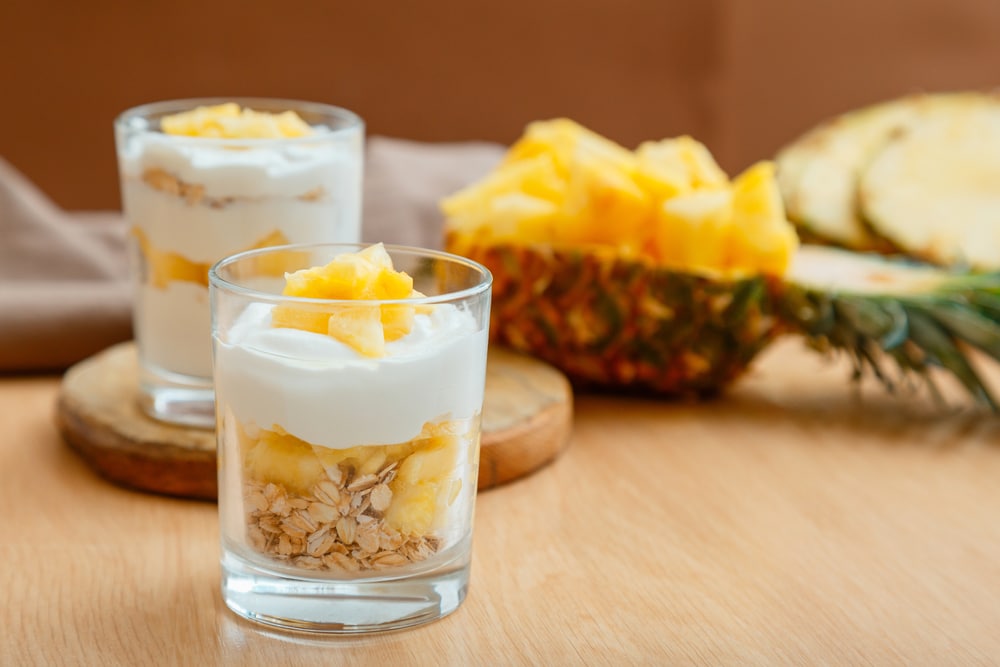 A view of a creamy pineapple delight in a cup