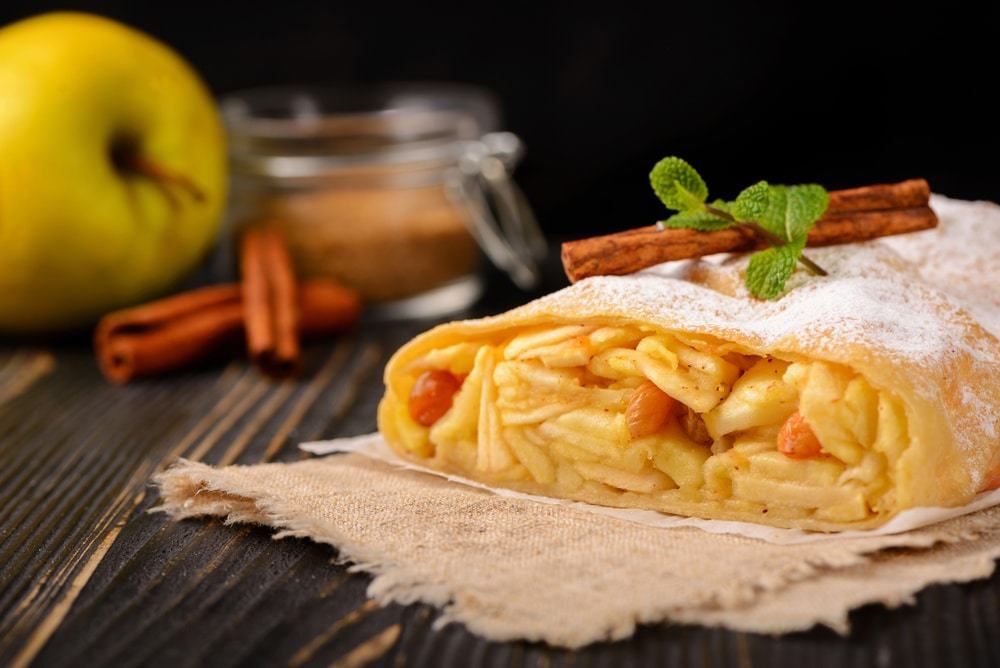 Classic Apple Strudel On A Wooden Board Apfelstrudel