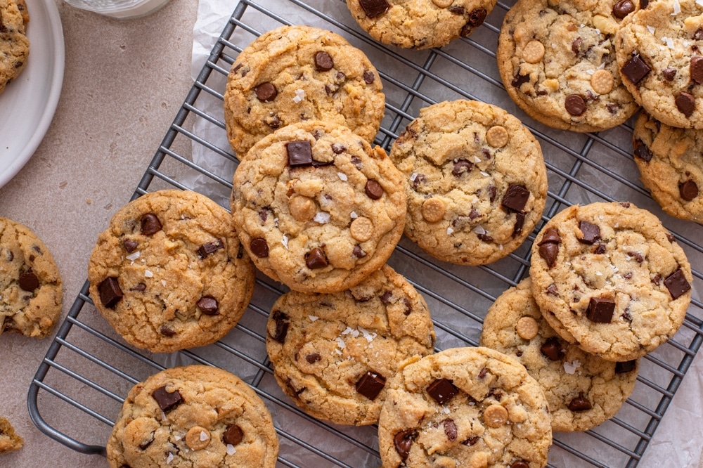 Chocolate Chip Cookies On A Cooling Rack With Flaky Salt