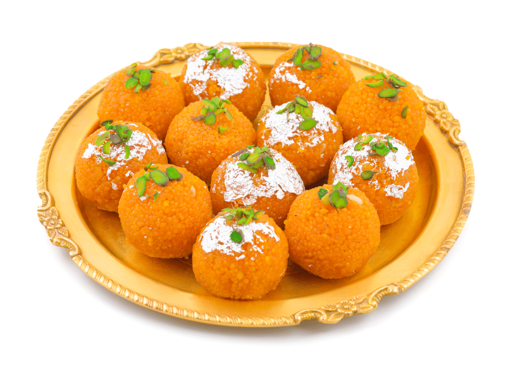 Indian Sweet Motichoor laddoo served in a golden tray