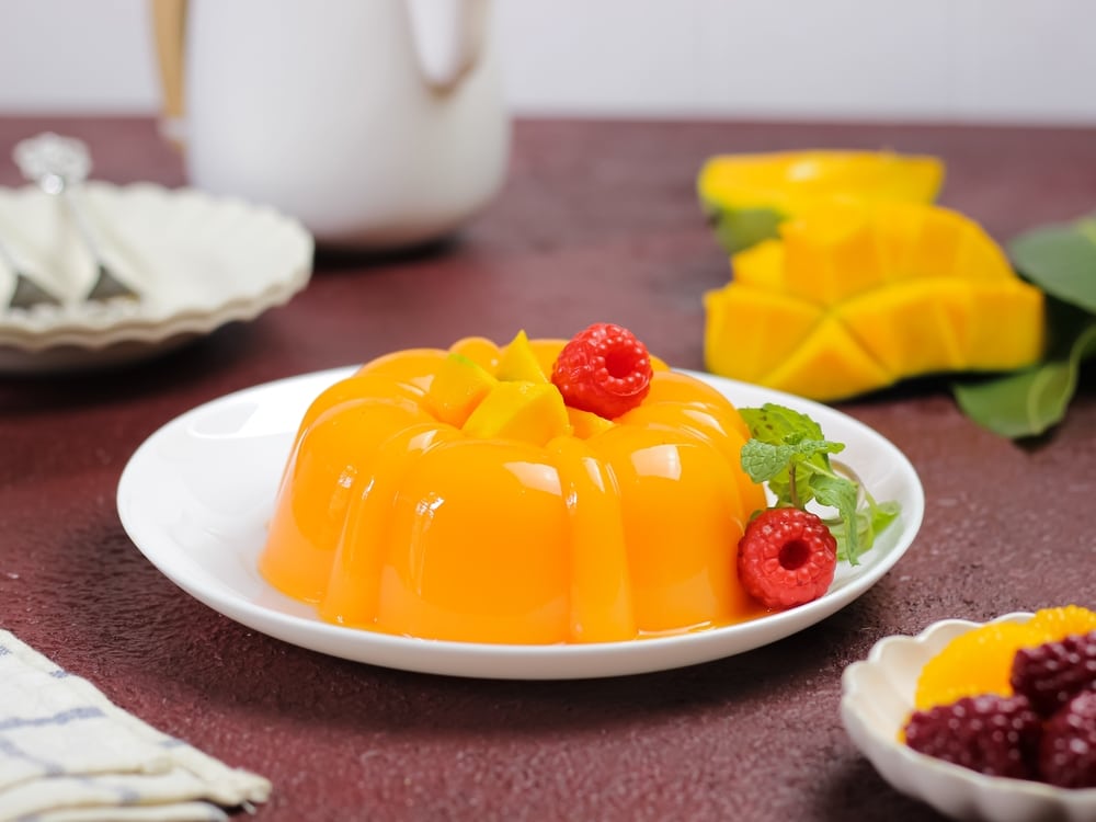 Mango Pudding With Chopped Mango And Rapsberry On Top Served