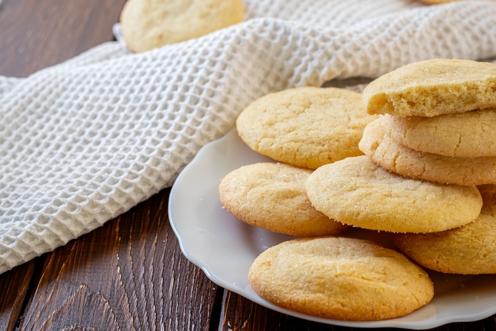 Delicious Sugar Cookies On Wooden Table 