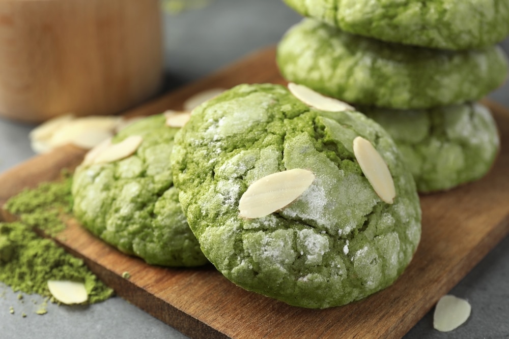 Tasty Matcha Cookies Almond Flakes And Powder On Grey Table