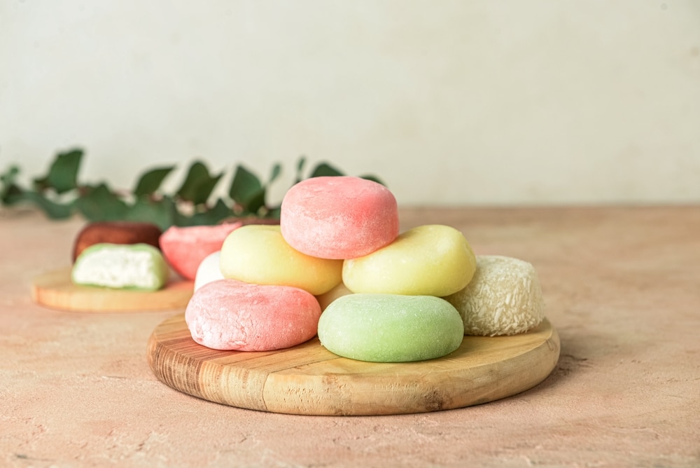 Wooden Board With Tasty Japanese Mochi On Table