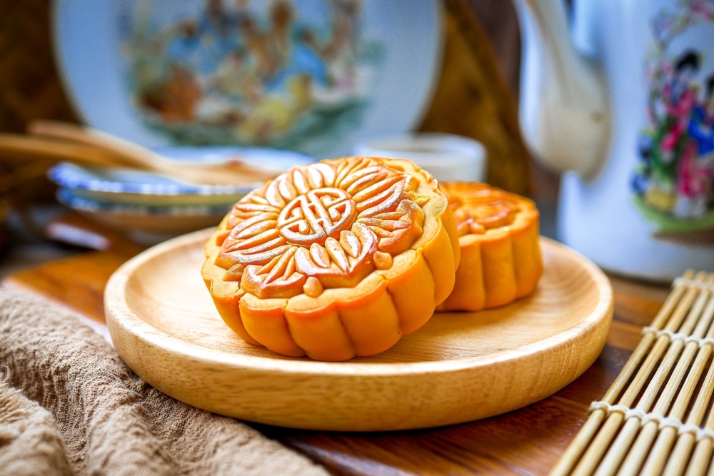 moon cakes in a wooden tray 