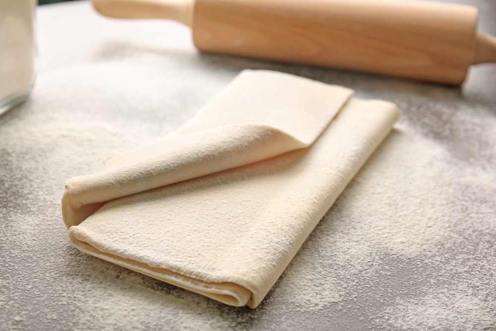 Fresh Raw Puff Dough On Table