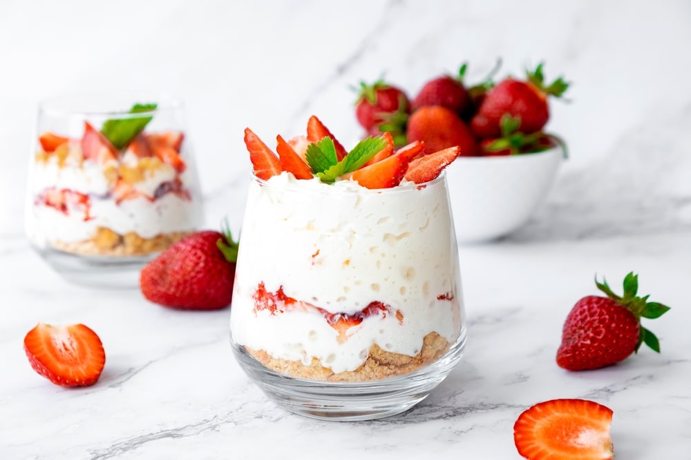 Strawberry Dessert With White Cocolate Whipped Cream Granola And Fresh