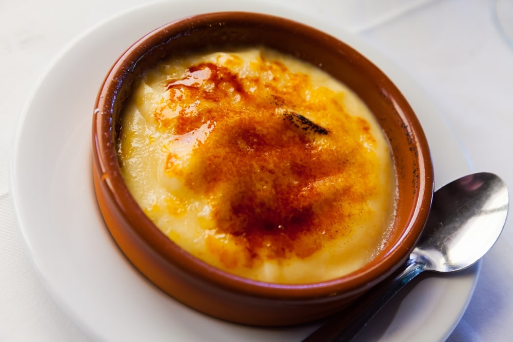 Image Of Tasty Dessert Catalana Crema Served With Caramel Crust