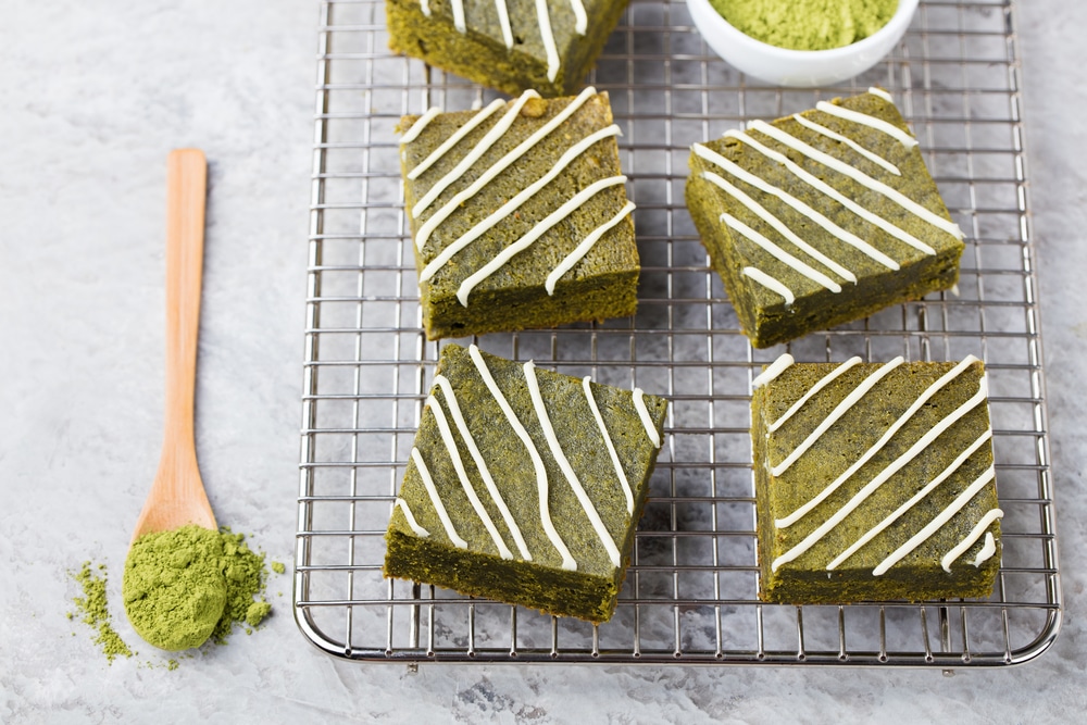 Matcha Green Tea Brownie Cake With White Chocolate On A